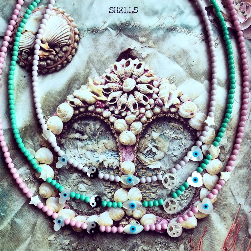 Mother of Pearl Symboleyes Glass Bead Necklace