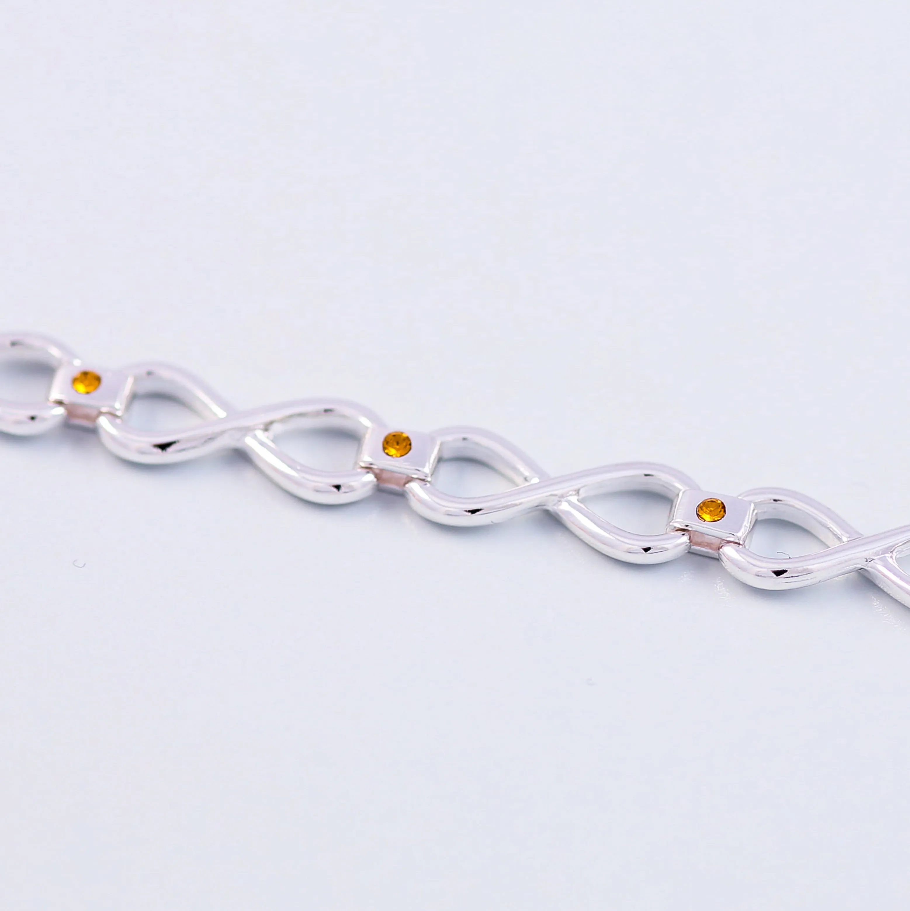 Silver Topaz November Birthstone Infinity Link Bracelet
