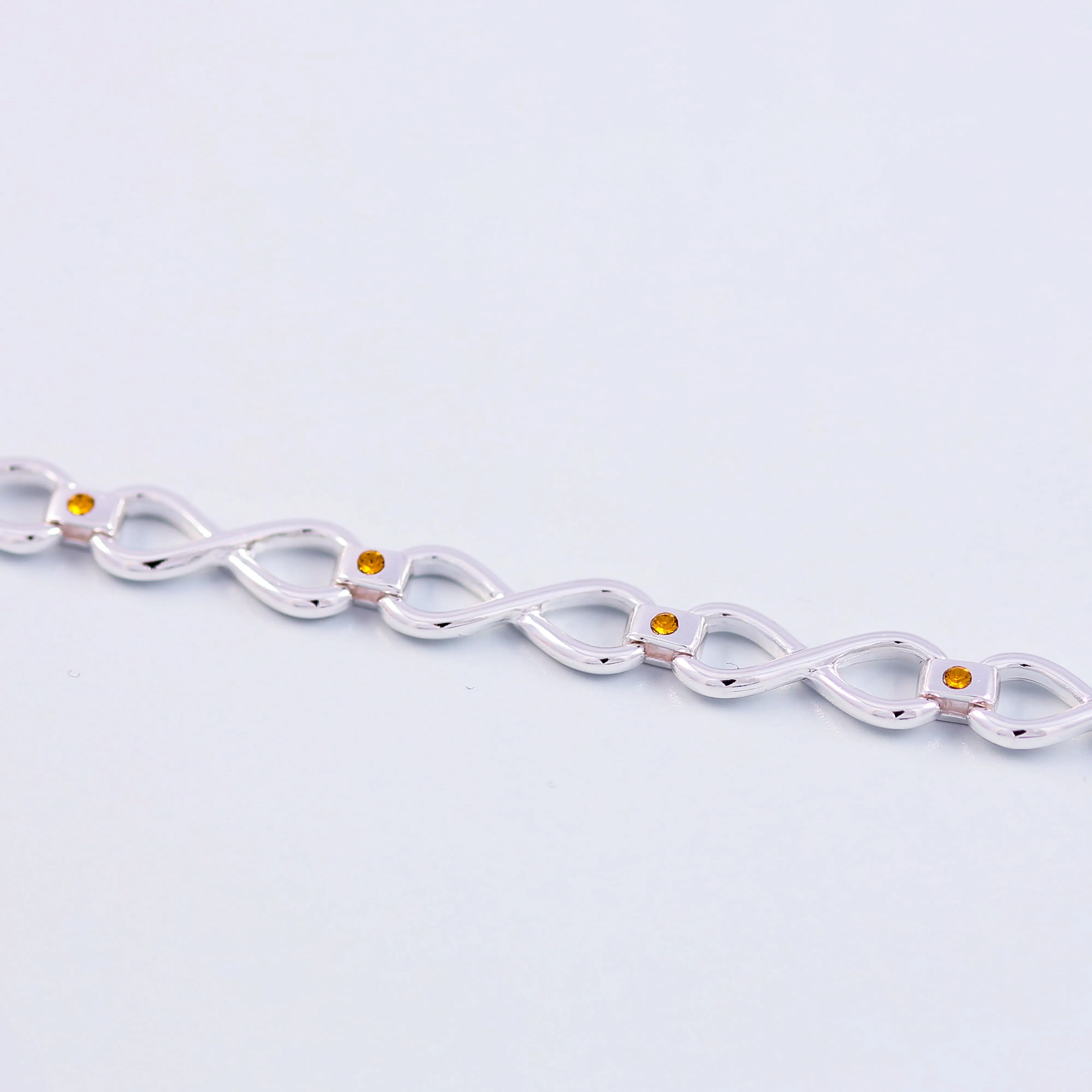 Silver Topaz November Birthstone Infinity Link Bracelet