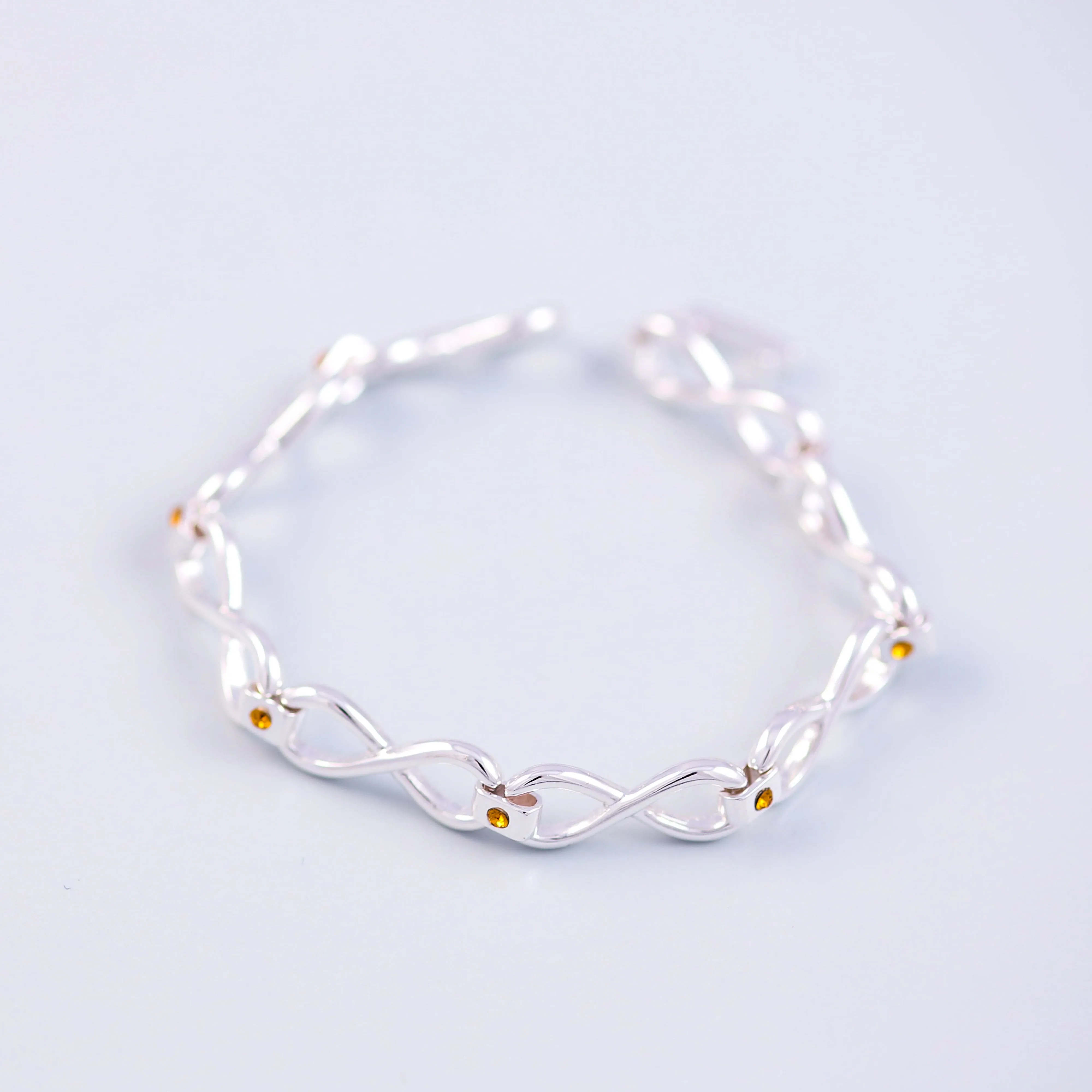 Silver Topaz November Birthstone Infinity Link Bracelet